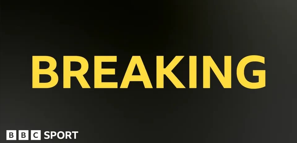 Слово 'BREAKING' на черном фоне