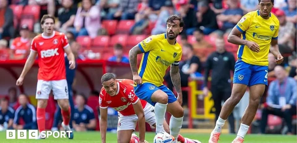 Игроки команды Portsmouth на поле во время матча