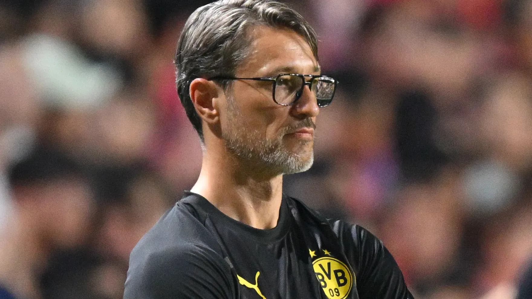 Тренер команды Borussia Dortmund на скамейке запасных