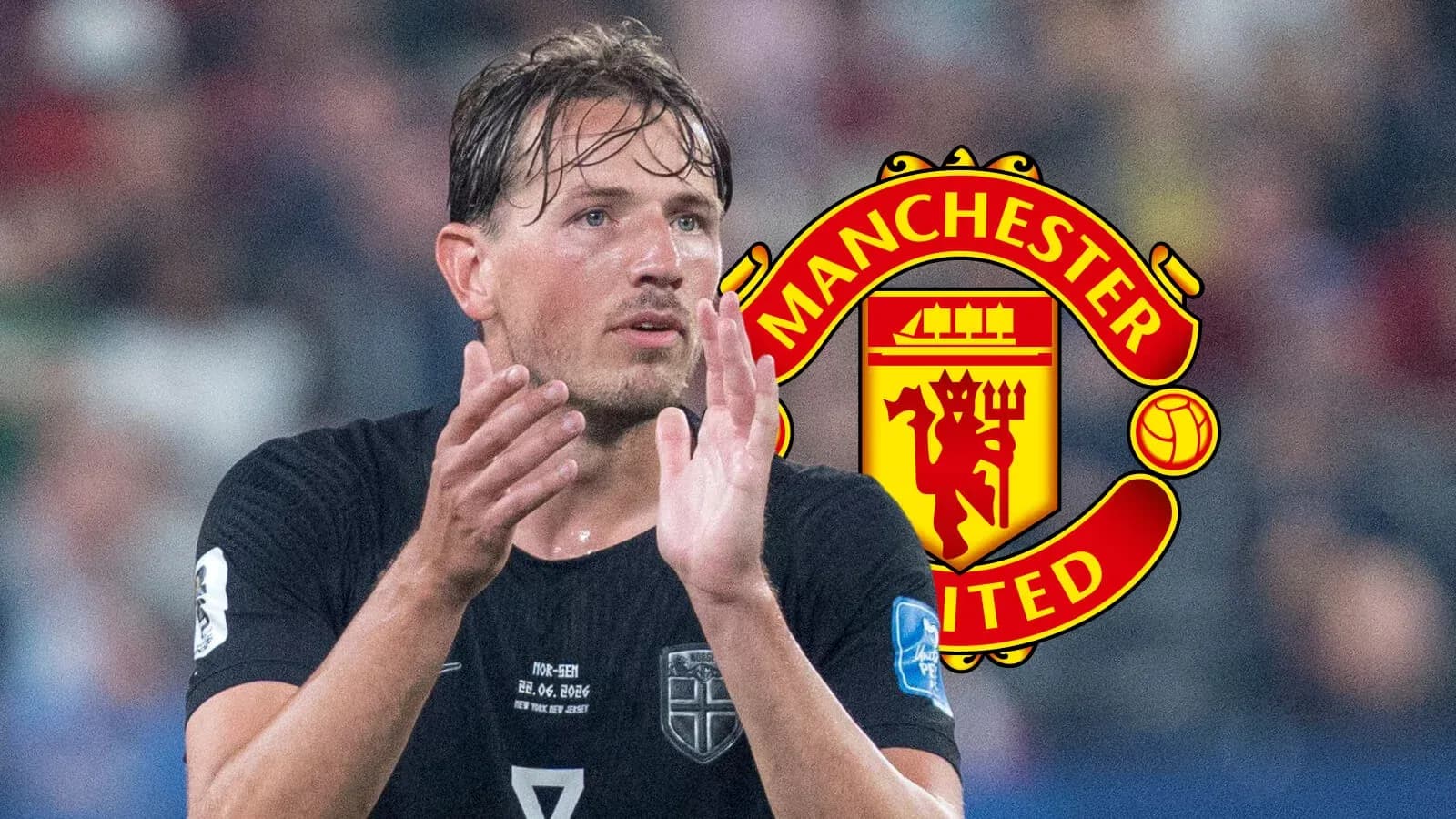 Игрок applauding на фоне логотипа Manchester United Игрок applauding на фоне логотипа Manchester United