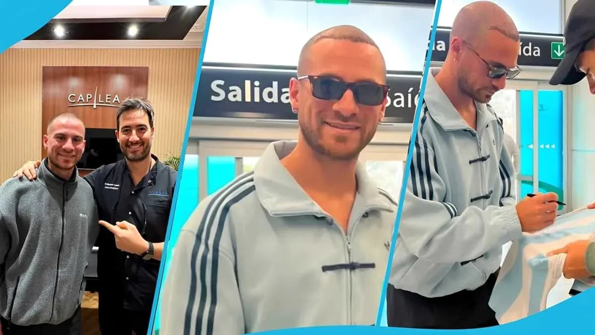 Человек в спортивной одежде подписывает футболку Человек в спортивной одежде подписывает футболку